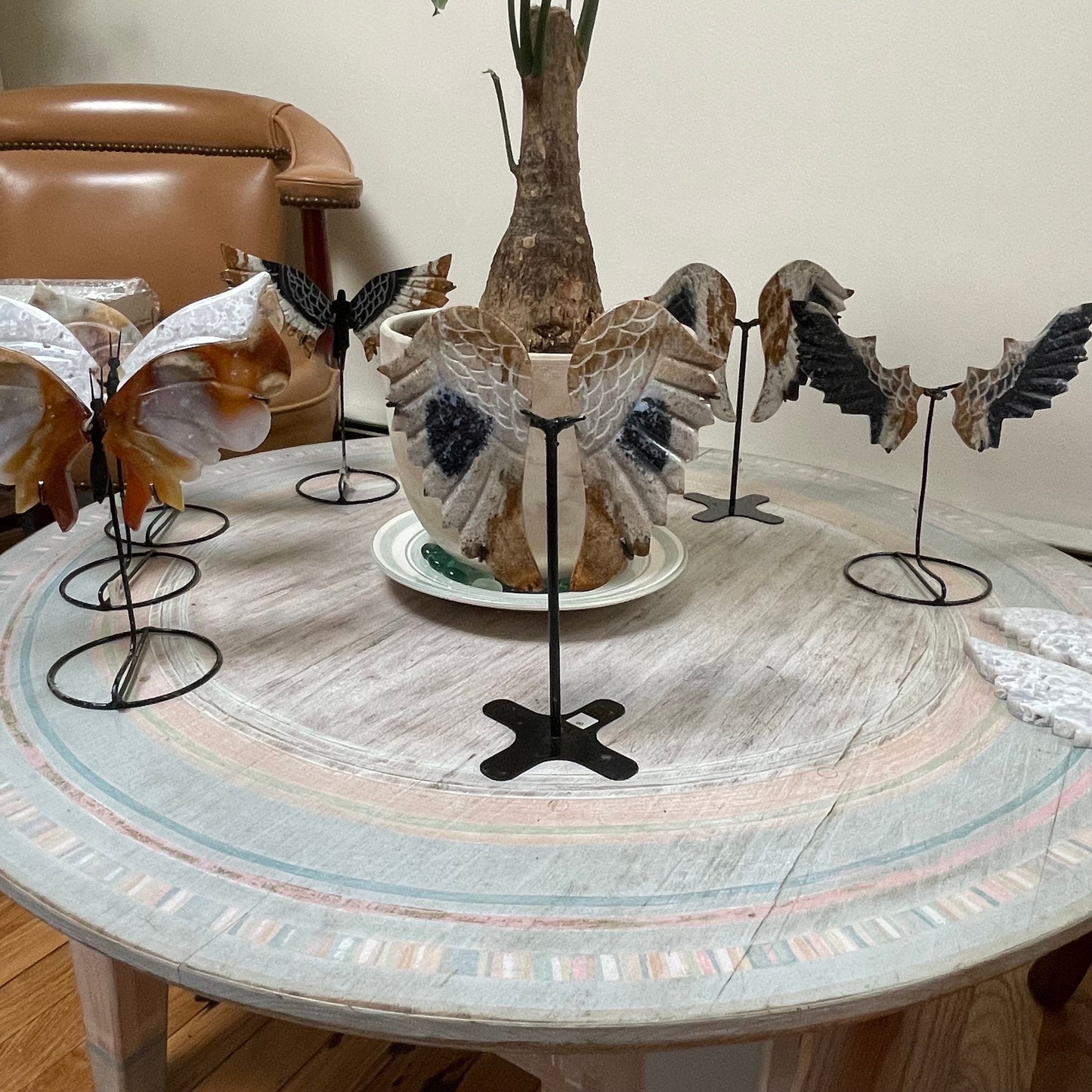 Fossilized Palm Root Crystal Angel Wings on stand