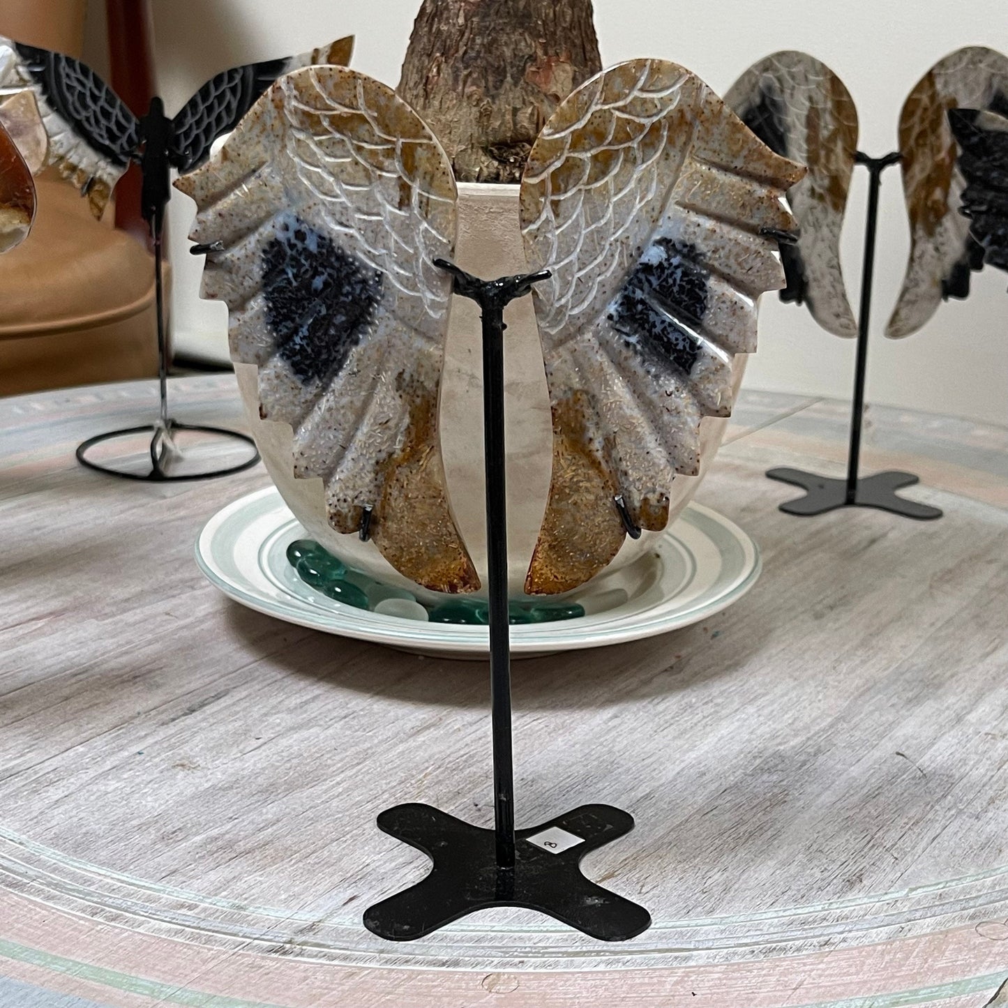 Fossilized Palm Root Crystal Angel Wings on stand