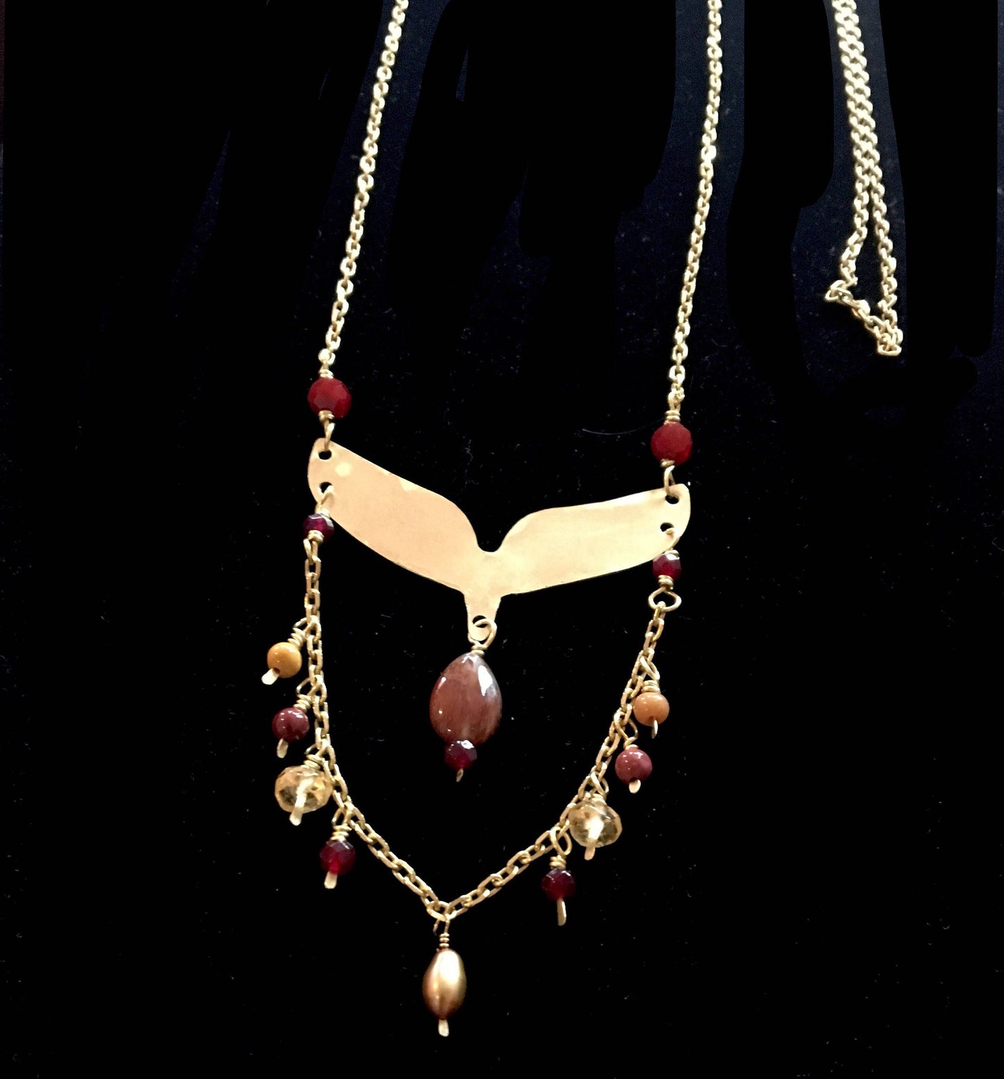 The Phoenix Necklace in Brass